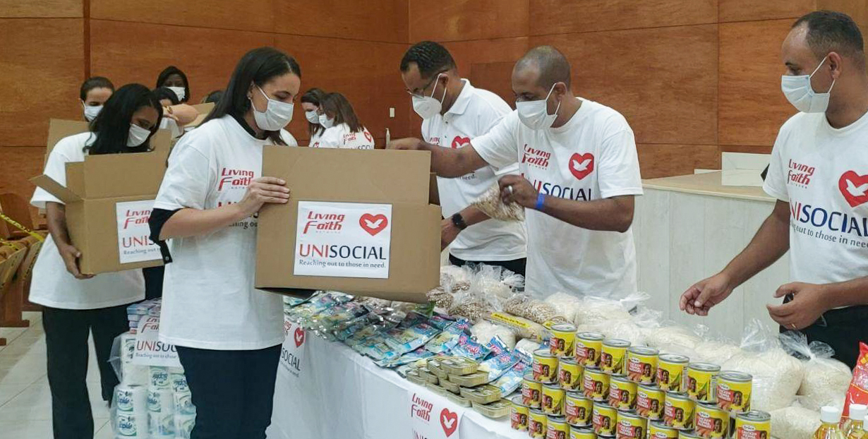 Unisocial team members prepare boxes to be taken into local communities